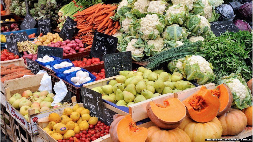 A view of fruit and vegetable stalls at a market in Lille, on August 18, 2013.