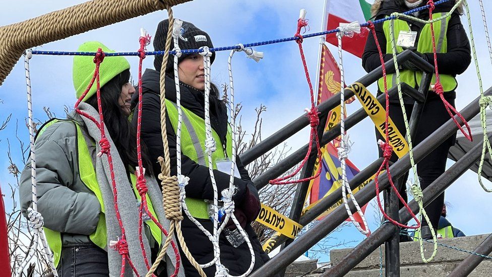 Nooses hang as Iranians protest in Richmond Hill, Canada, on the 44th anniversary of the Islamic Revolution (11 February 2023)