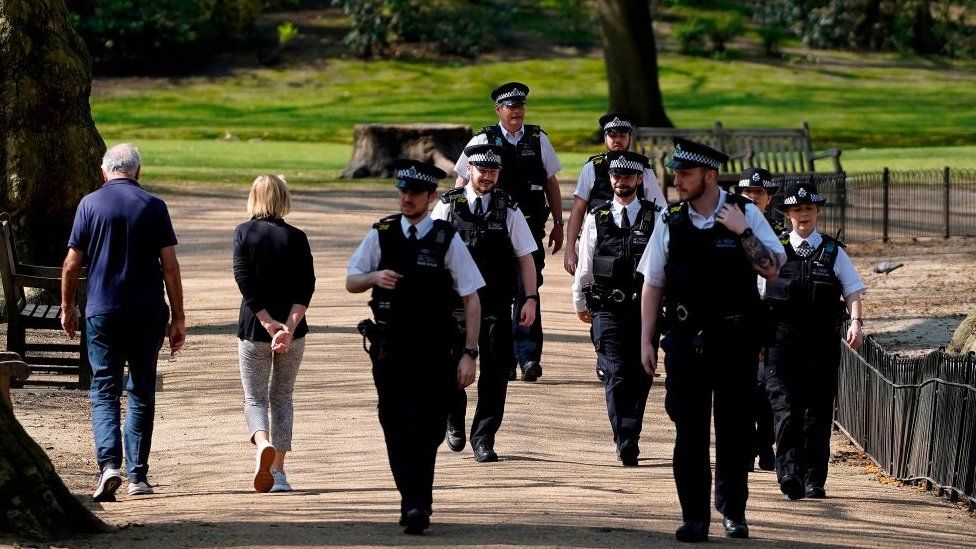 Police patrolling a park