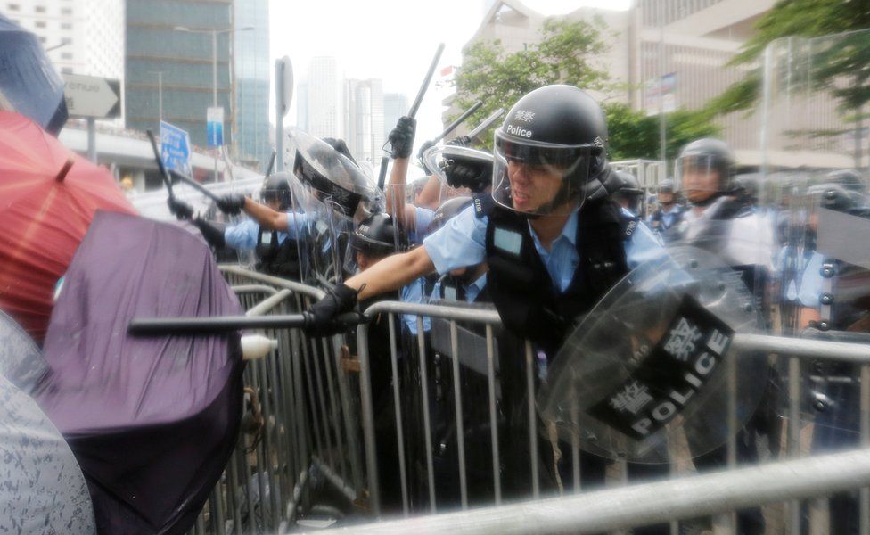 Riot police clash with protesters in Hong Kong, 12 June