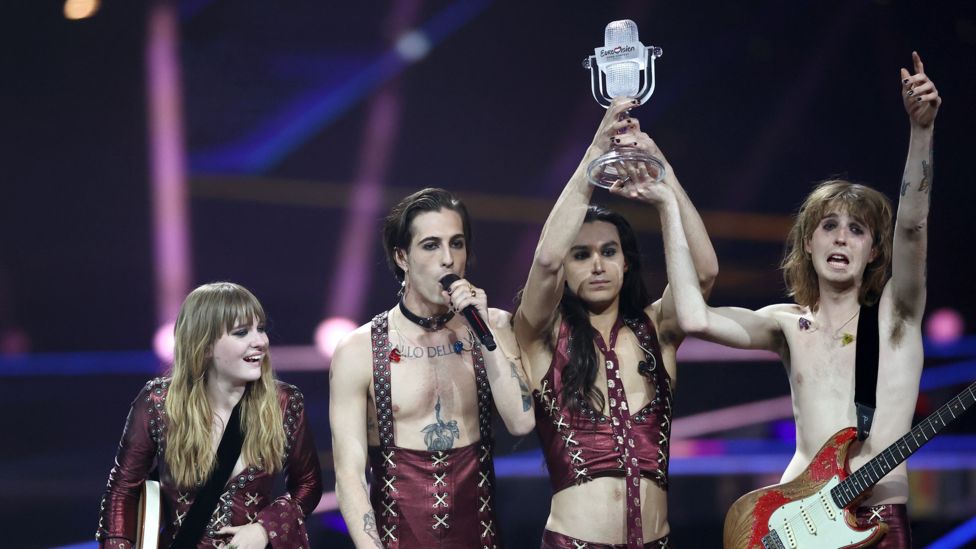 Italian rock bank Maneskin holding the Eurovision trophy at the Eurovision Song Contest 2021