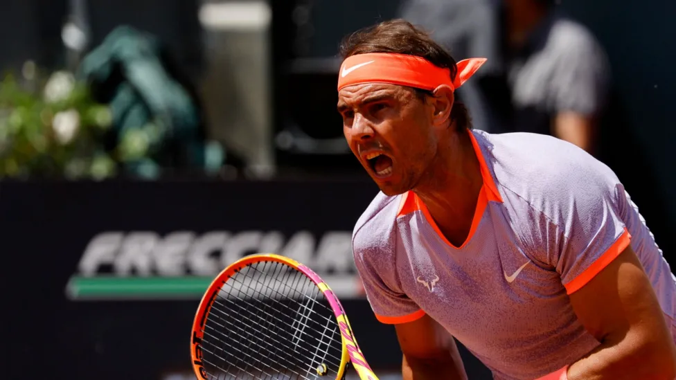 Resilient Nadal Stages Comeback, Advances to Second Round in Rome.