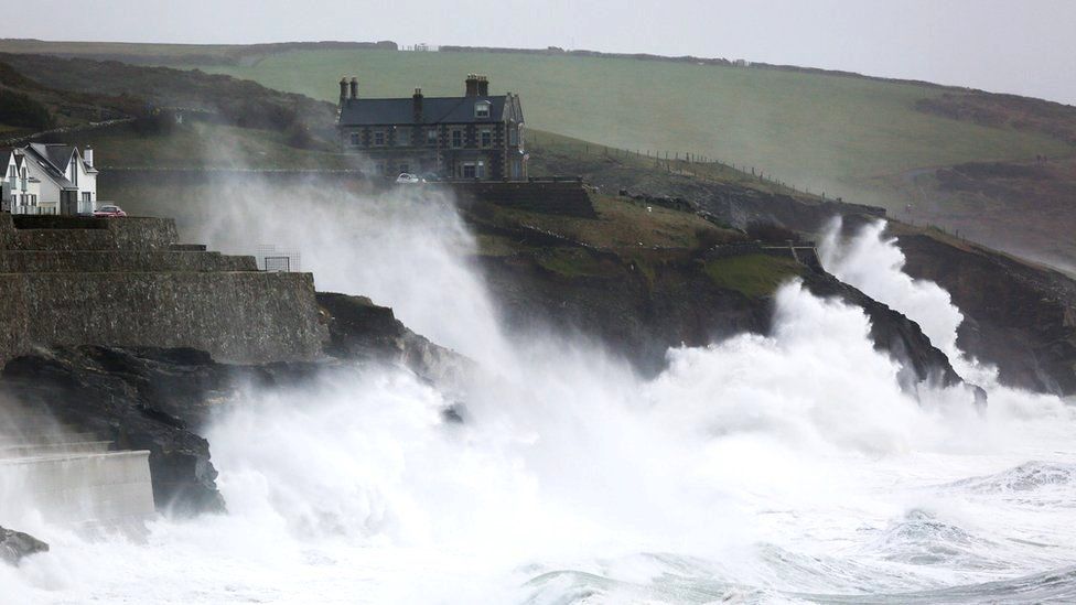 Waves crash into the wall at Porthleven in Cornwall, as Storm Ciara pummels the British coastline, 9 February 2020
