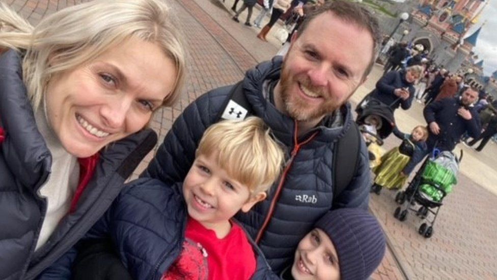 Damien with his wife and two children at Disneyland Paris