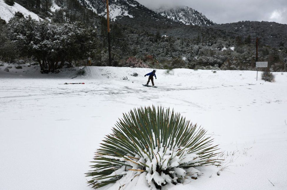 A snowboarder seen on Thursday in the San Gabriel mountains
