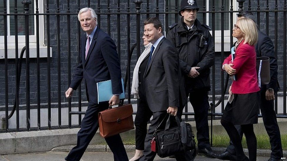 Michel Barnier and other EU officials arriving in Downing Street