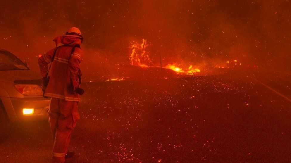 Embers fall around a photographer as the Creek Fire rapidly expands in California. Photo: September 2020