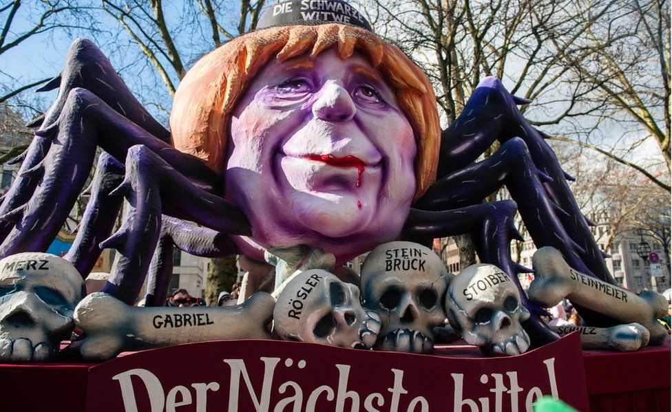 A float featuring German Chancellor and leader of the German Christian Democrats (CDU) Angela Merkel is seen during the annual Rose Monday parade on February 12, 2018 in Dusseldorf, Germany