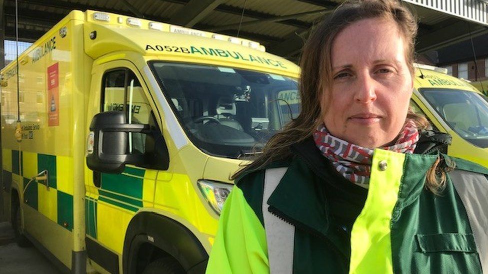 Michelle Doherty next to an ambulance