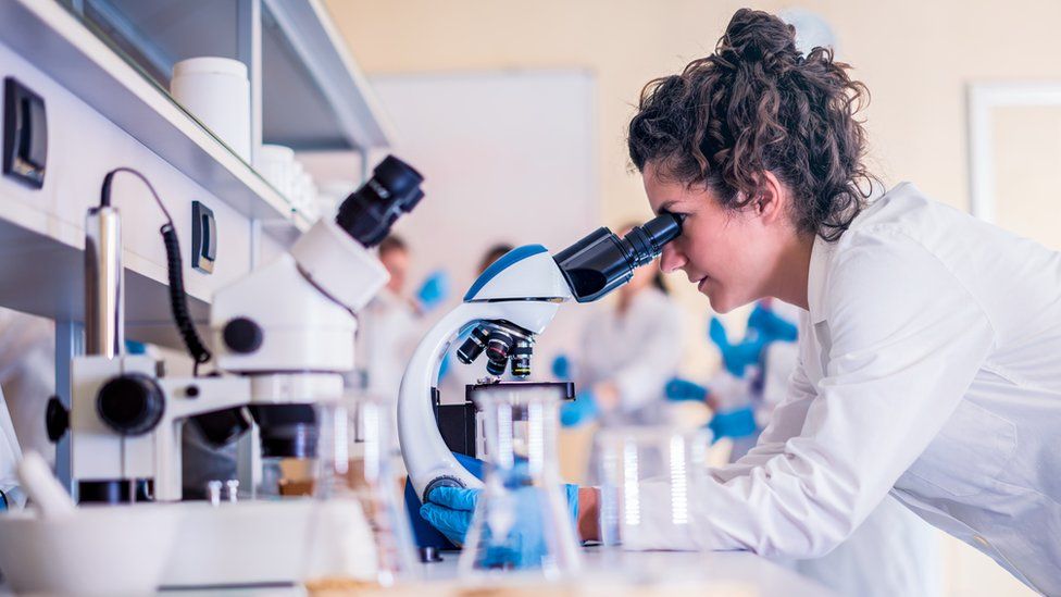 Stock photo of a woman in a lab