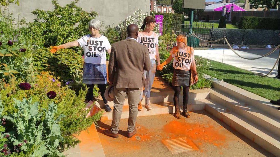 The three protesters at the Chelsea Flower Show