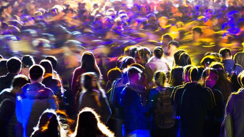 Crowd of people on a night out
