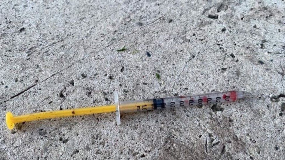 One of the discarded needles