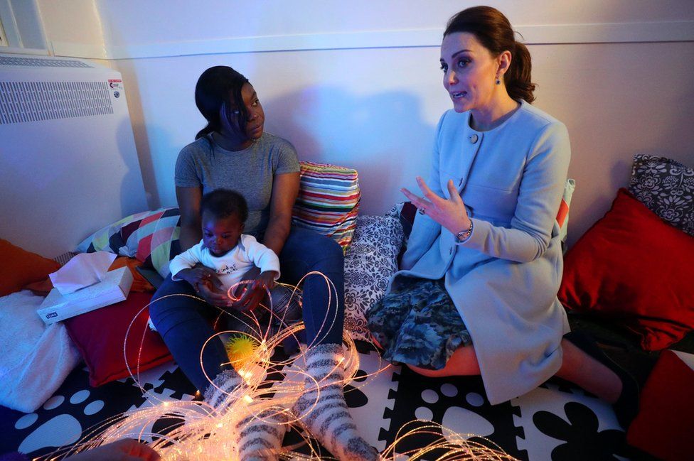 Britain's Duchess of Cambridge, speaks to a patient during a visit to the sensory room of the Mother and Baby Unit at the Bethlem Royal Hospital in south London, Britain, 24 January 2018.