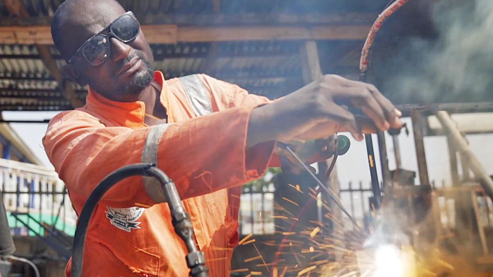 Kabir Abu Bilal welding at his workshop in Zaria, Nigeria - December 2023