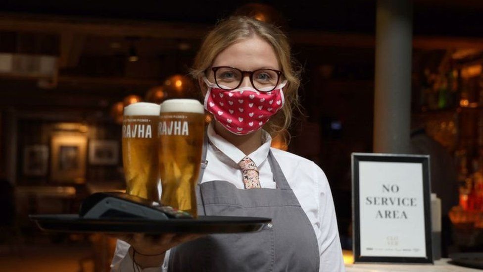 Bartender serving drinks