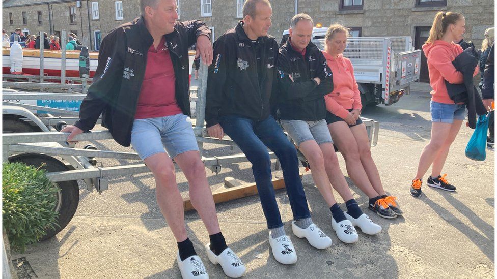 The Dutch team wearing their clogs