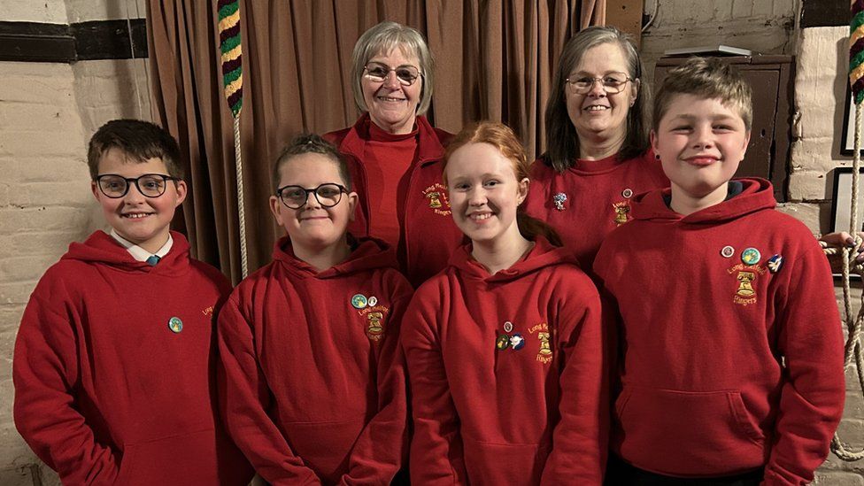 The four young bell ringers with tutors Linda Goodban and Theresa Munford