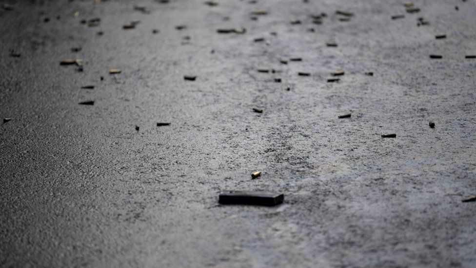 Bullet caskets are seen on the ground at the crime scene after Mexico City's Public Security Secretary Omar Garcia Harfuch was wounded in an attacked in Mexico City, on June 26, 2020