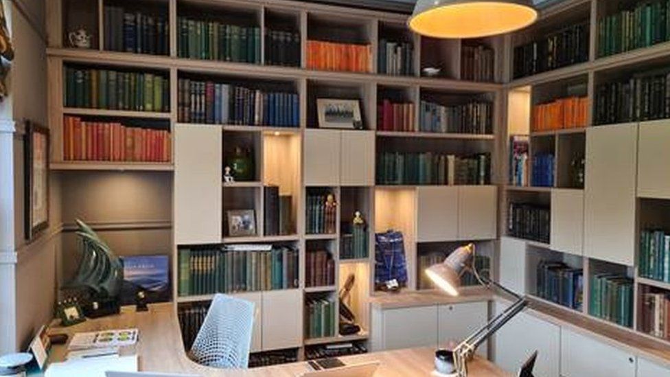 Image of a workspace decorated with books