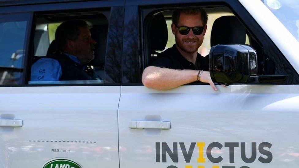 The Duke of Sussex driving a Land Rover