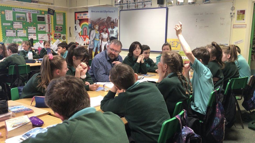 campbell hamilton sitting with pupils