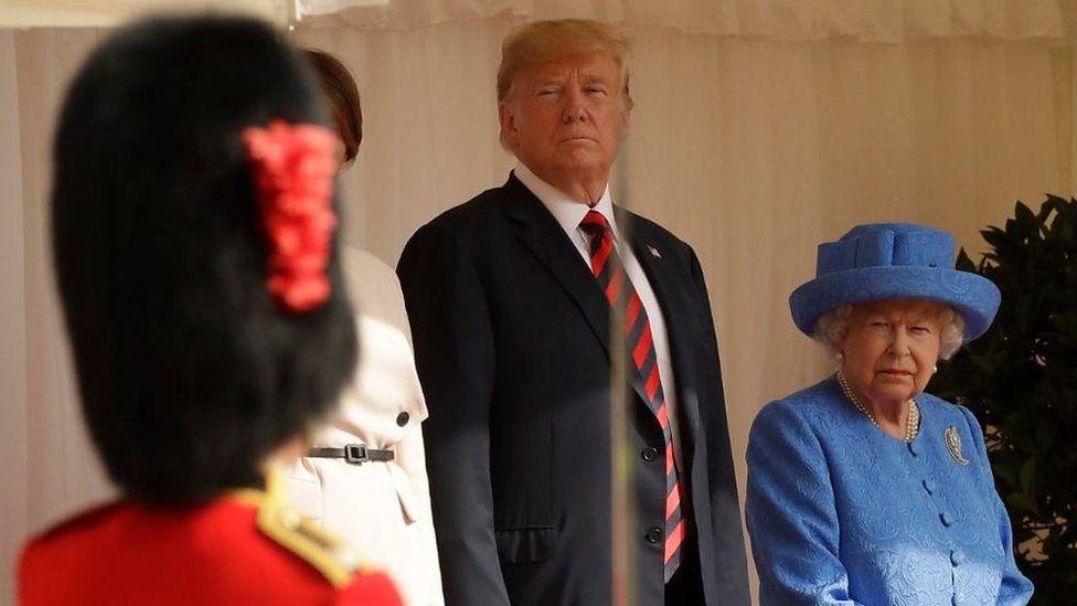 Donald Trump and Queen Elizabeth inspect troops during a ceremony full of pageantry at Windsor Castle.