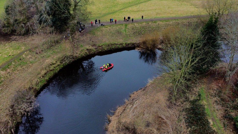Police search team on the River Wyre