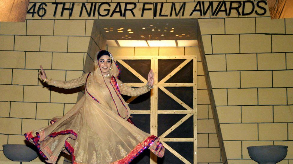 Pakistani actress Meera dances during the 46th Nigar Public Film Awards ceremony in Lahore, early 03 April 2004