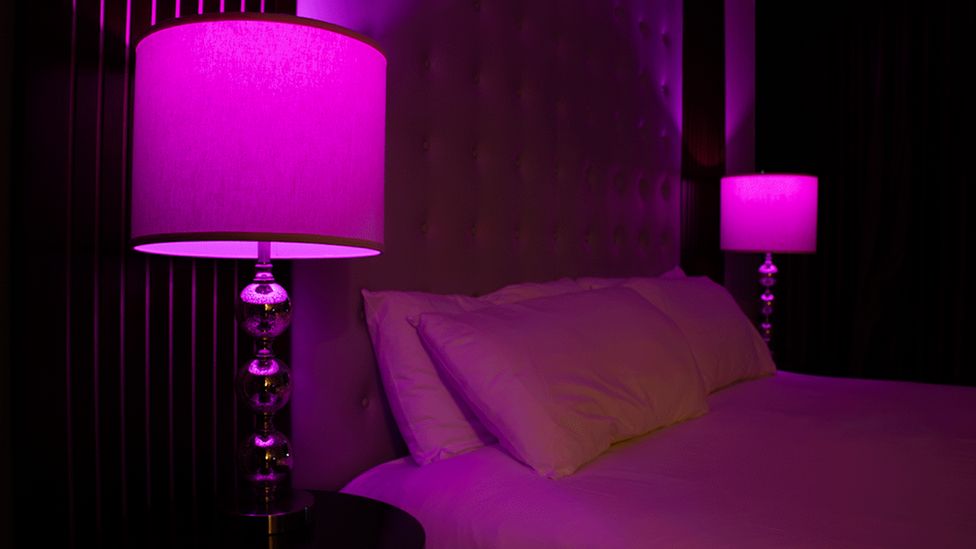 Pink light from bedside lamps