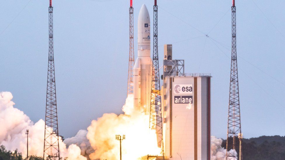An Ariane V rocket lifts off from the European spaceport in Kourou