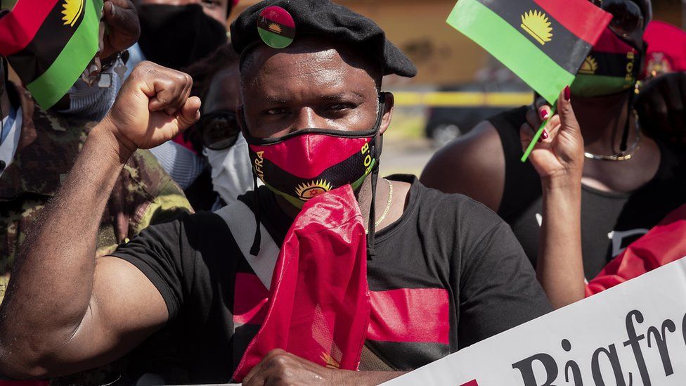 An Ipob member with raised fist
