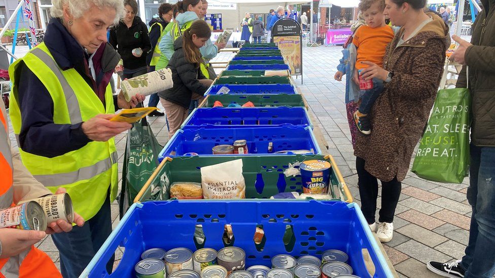 Volunteers sorting donations of food for Salisbury's foodbank