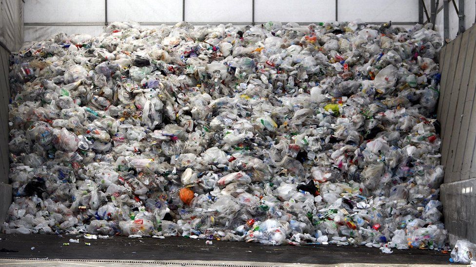 General view of a pile of rubbish containing plastic carrier bags