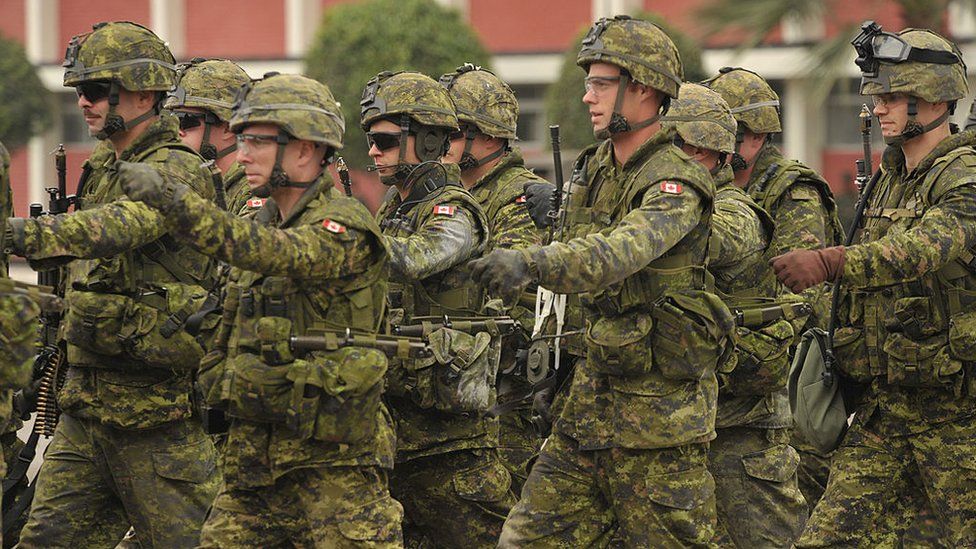 Canadian soldiers marching