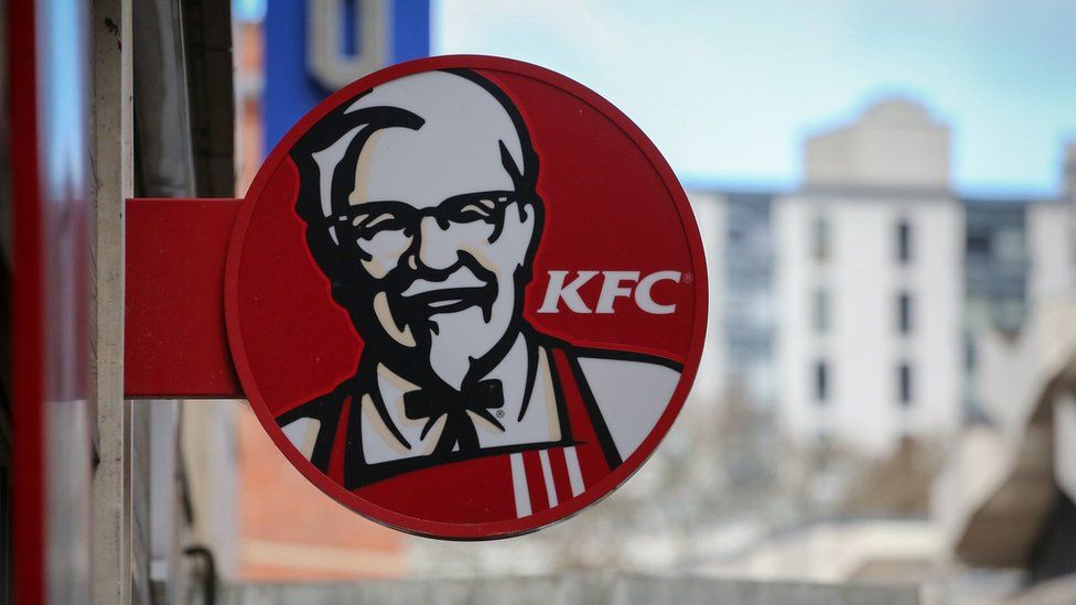 The logo of KFC displayed outside of a branch closed due to a chicken shortage
