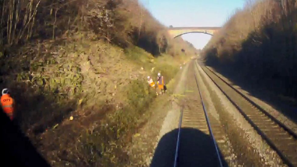 CCTV image taken from front of train as it approaches a tree on railway line