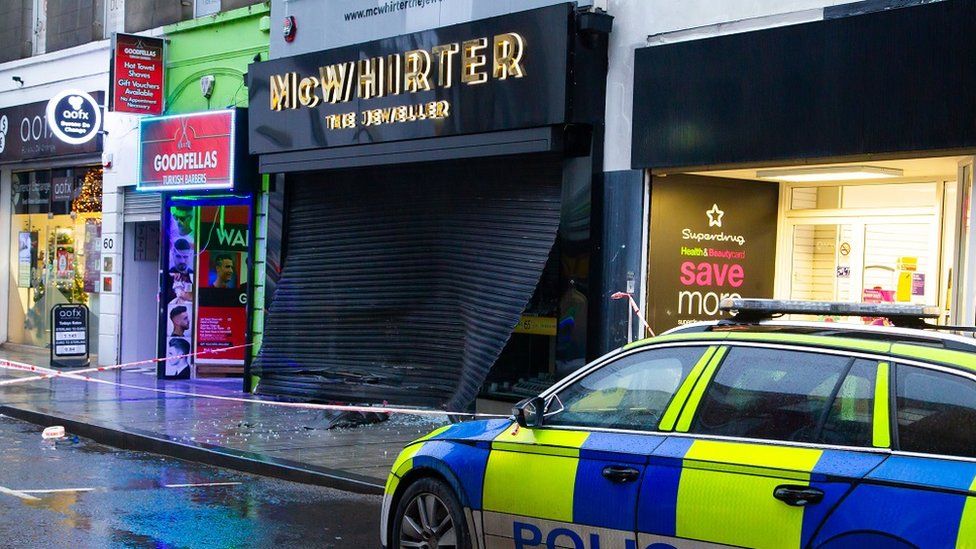 Damaged shutter of jewellers in Newry