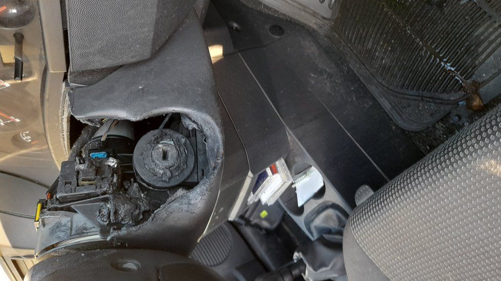 Damage to ignition and steering wheel after Ryan set fire to the car