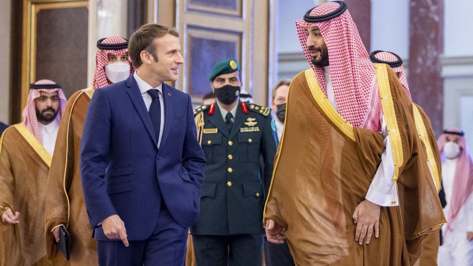 French President Emmanuel Macron (L) meets Crown Prince and Defence Minister of Saudi Arabia Mohammad bin Salman in Jeddah in December 2021