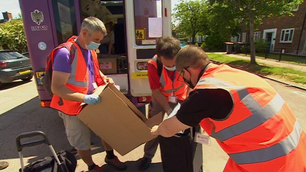 Volunteers delivering Covid tests in Bedford