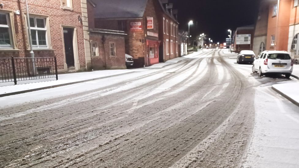 Snow-covered road in Wrexham town centre