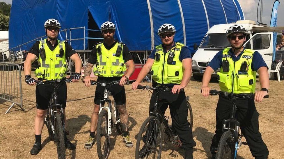 Officers, including Paul Ayling (second from left), at Bedford River Festival