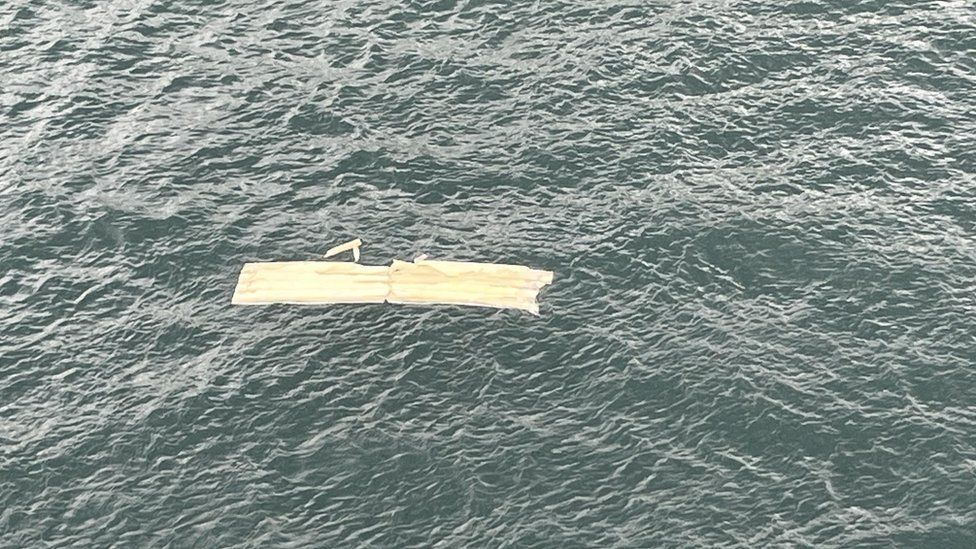 Debris in the water from lifeboat