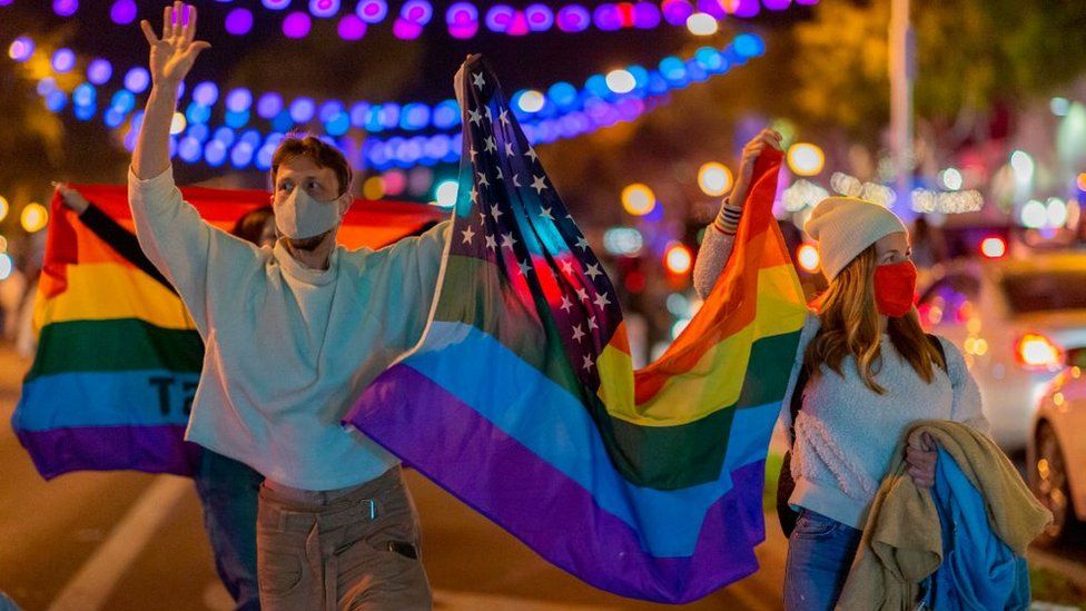 Pro-LGBT Biden supporters in West Hollywood celebrate his victory last year