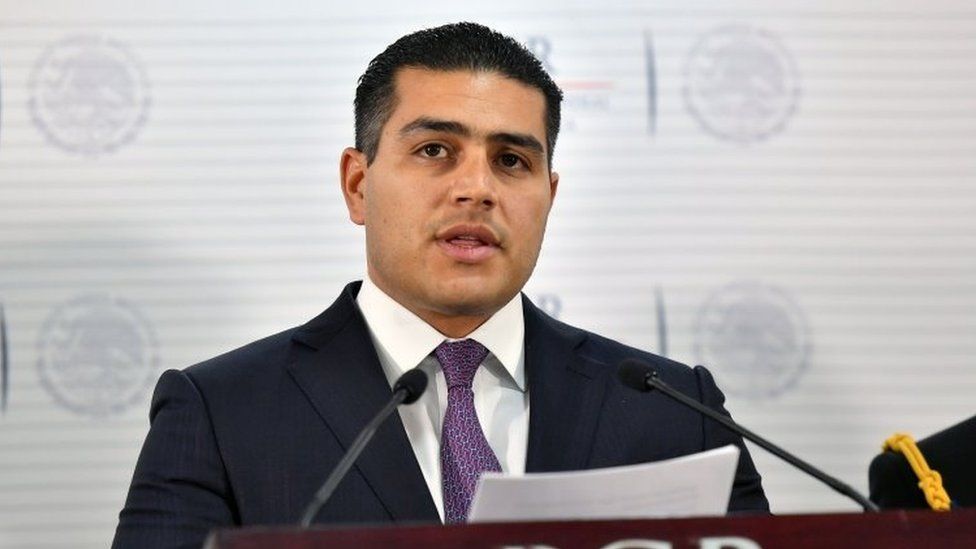 In this file photo taken on April 01, 2017 the director of the Criminal Investigation Agency (AIC) of the Attorney General"s Office (PGR) Omar Hamid Garcia Harfuch speaks about the arrest of a gang of kidnappers in Veracruz, during a press conference at the Attorney General of the Republic (PGR) building in Mexico City