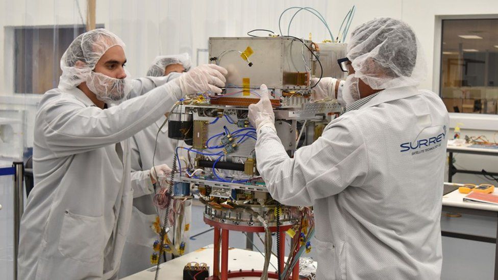 Development of the satellite to carry the clock was started by SSTL's US division