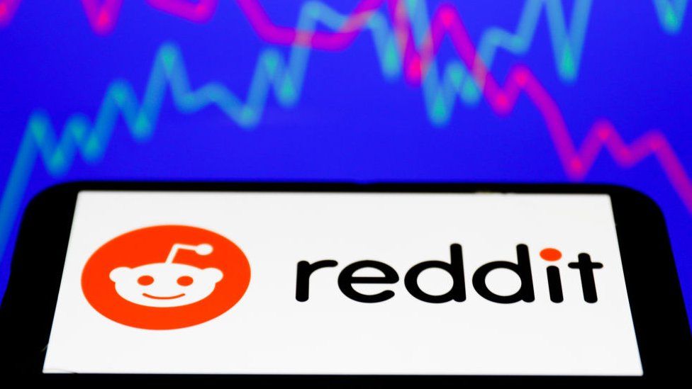 Reddit logo displayed on a phone screen