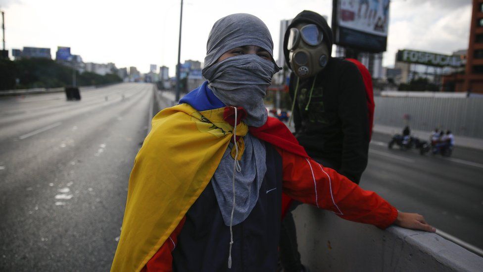 Masked anti-Maduro protesters in Caracas, 2 February