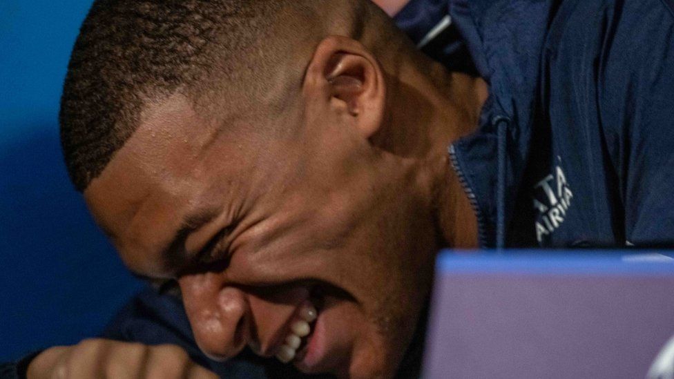Kylian Mbappé of Paris Saint-Germain smile during the press conference ahead of their UEFA Champions League group H match against Juventus, at Camp des Loges on September 5, 2022 in Paris, France